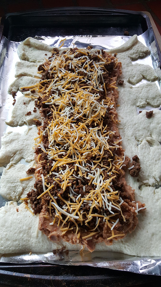 Making Taco Pizza Braid