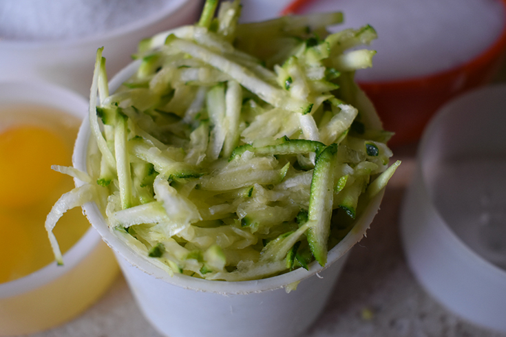 Shredded zucchini in a cup