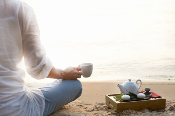 drinking tea by the beach